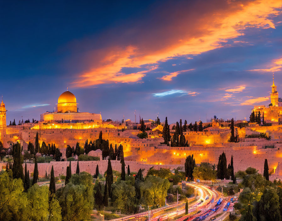 Twilight panoramic view of illuminated Dome of the Rock in Jerusalem