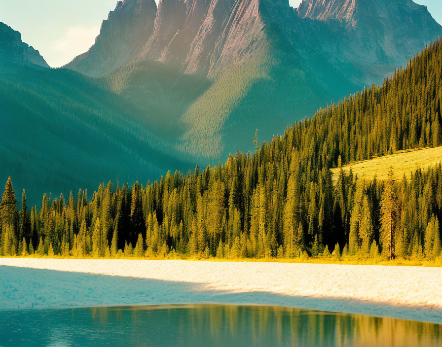 Tranquil lake with pine tree reflection and mountains under clear sky