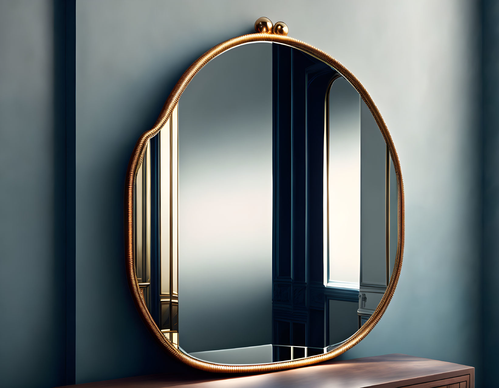 Golden-framed round mirror reflecting a bright interior with window