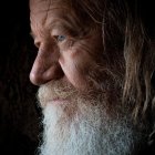 Elderly Man with White Beard and Deep-set Eyes