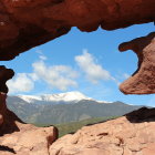 Surreal desert landscape with smooth rock formations and towering spires