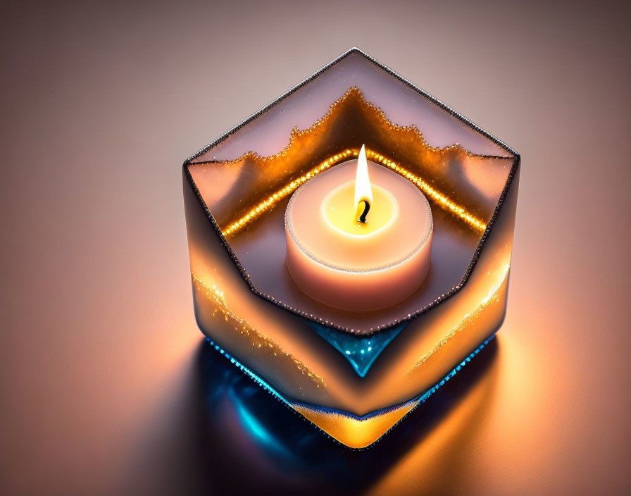 Reflective cube with lit candle on gradient background