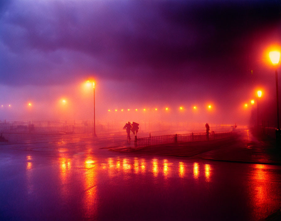 Rainy Evening Scene: Glowing Street Lights, Wet Pavement, Umbrella People