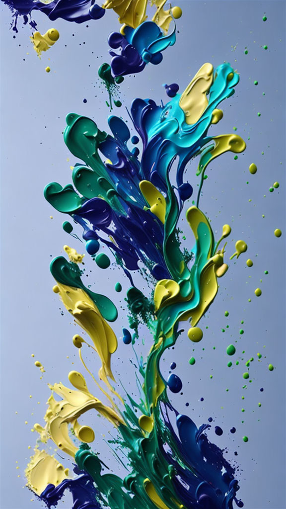 Abstract yellow and blue paint splashes on light background with suspended droplets