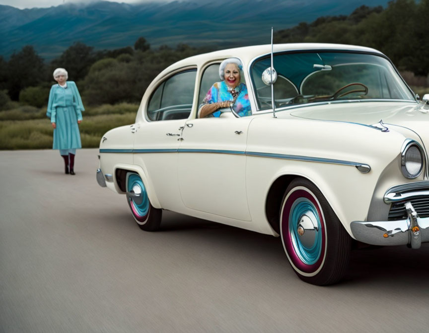 Elderly women with vintage car smiling in countryside