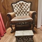 Luxurious golden throne with plush upholstery and pink decor