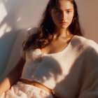 Woman in White Knit Sweater Sitting in Soft Sunlight