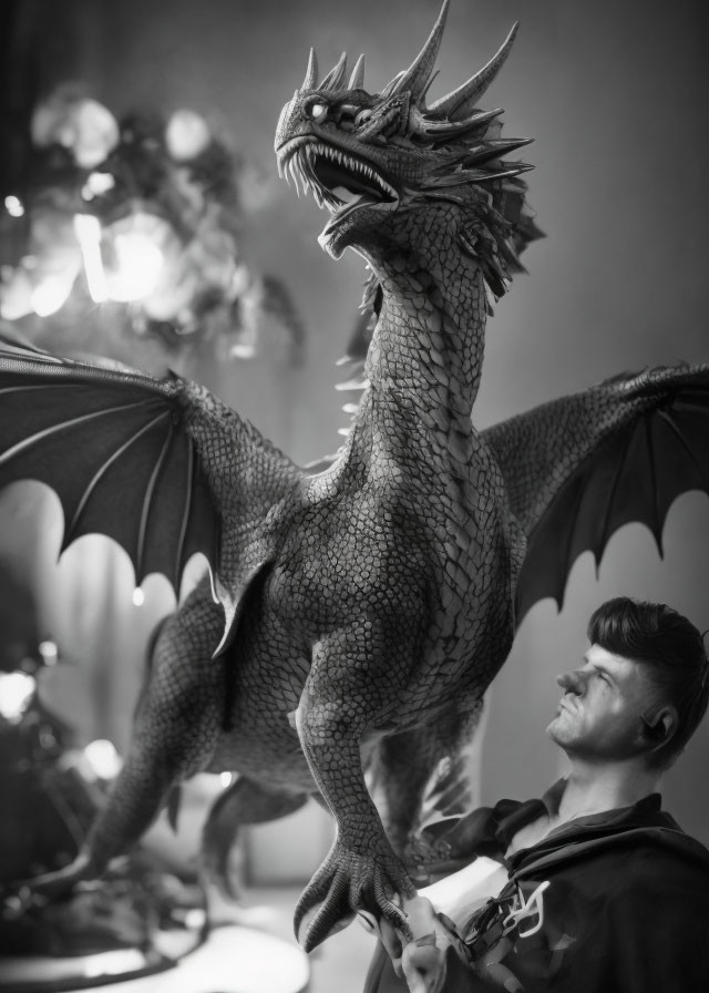 Detailed Monochromatic Dragon Figure with Outstretched Wings