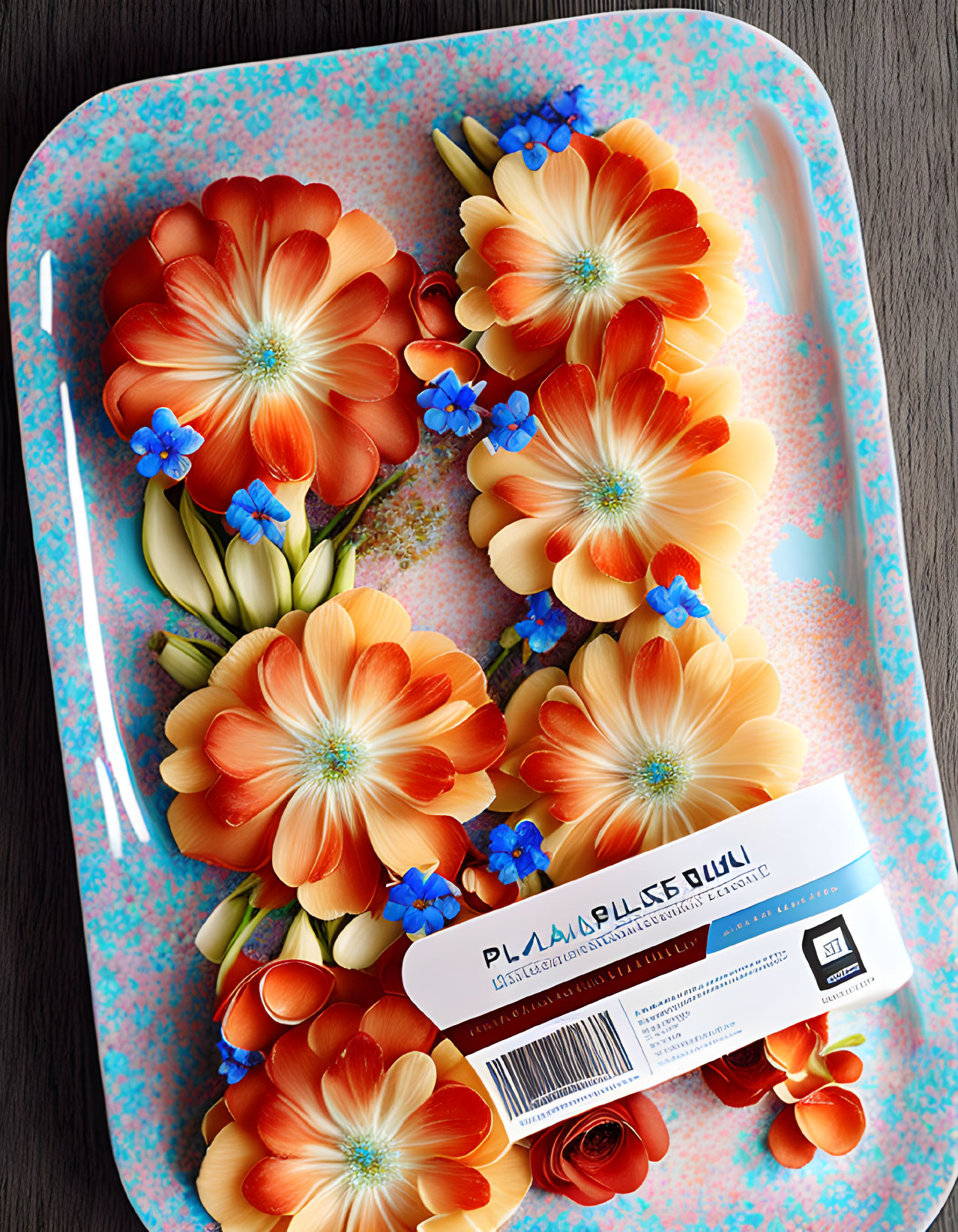 Colorful Floral Pattern Tray with Orange, Red, and Blue Flowers and Label