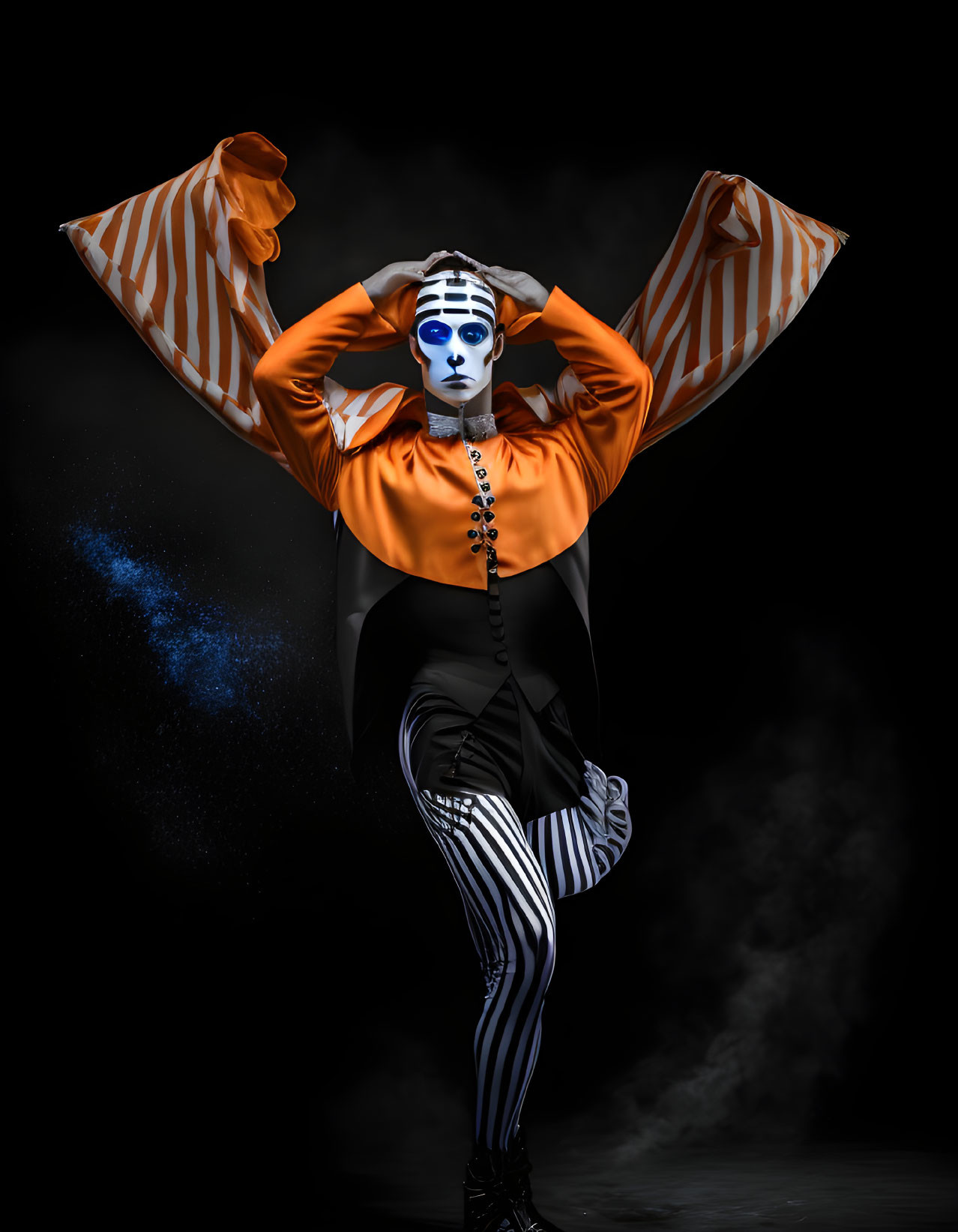 Blue and white face paint person in striped costume against black background