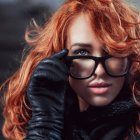 Vibrant digital artwork featuring a woman with red curly hair and steampunk accessories