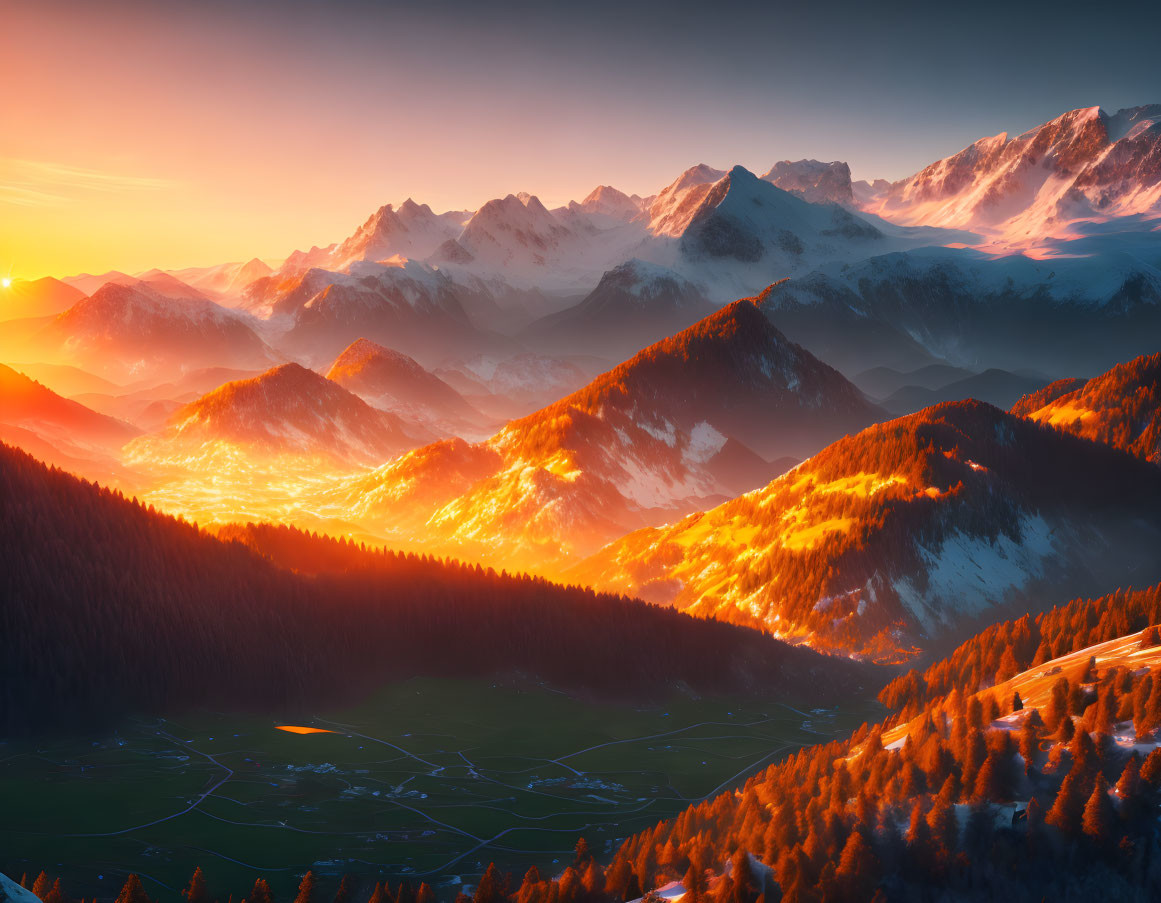 Majestic mountain range at sunset with snow-capped peaks