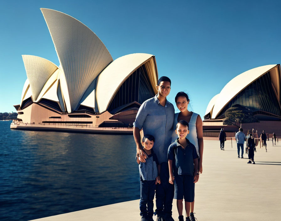 Family of Four Posing at Sydney Opera House on Sunny Day