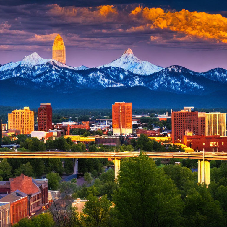 Modern city skyline with snowy mountains and vibrant dusk sky