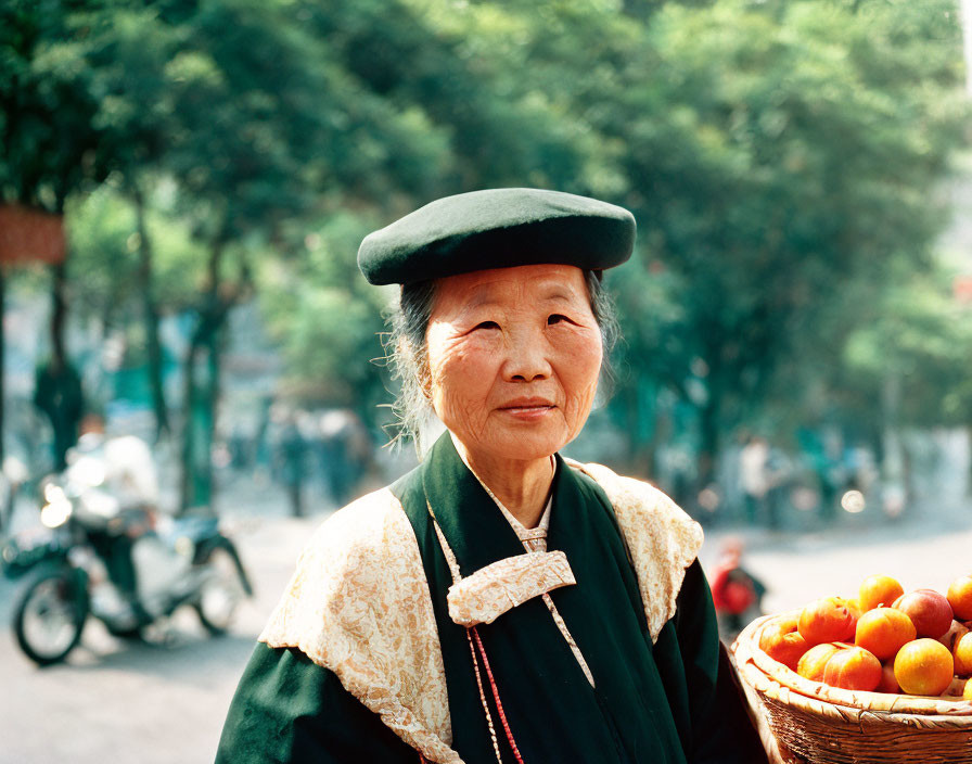 Elderly woman in traditional attire with oranges in street scene