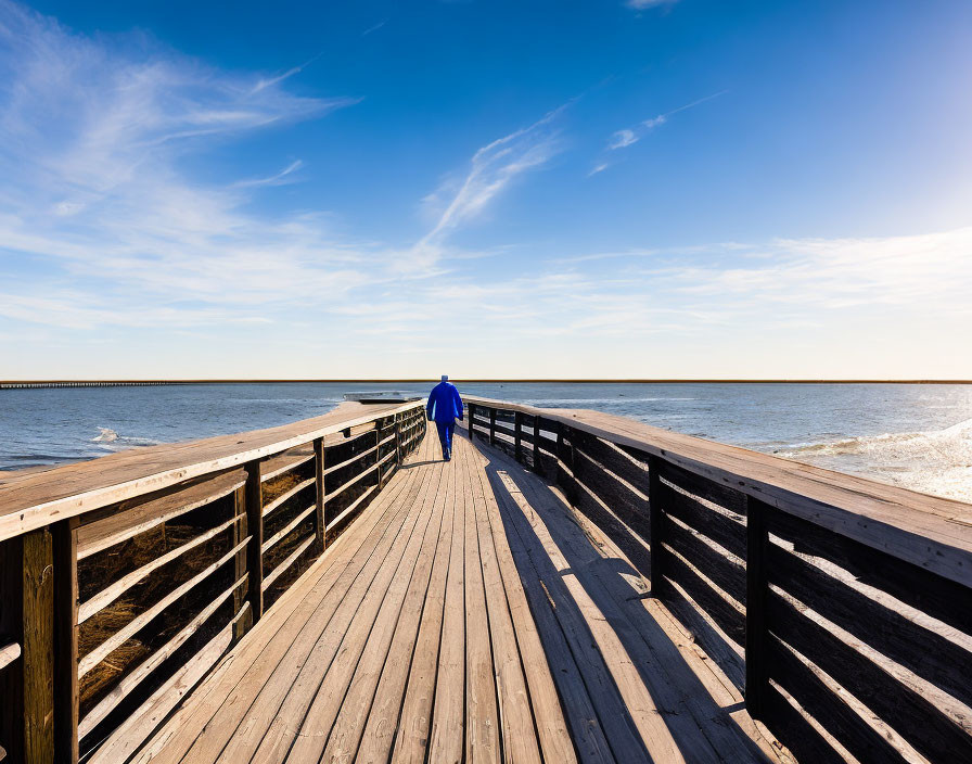 Man walking the boardwalk in Wildwood New jersey