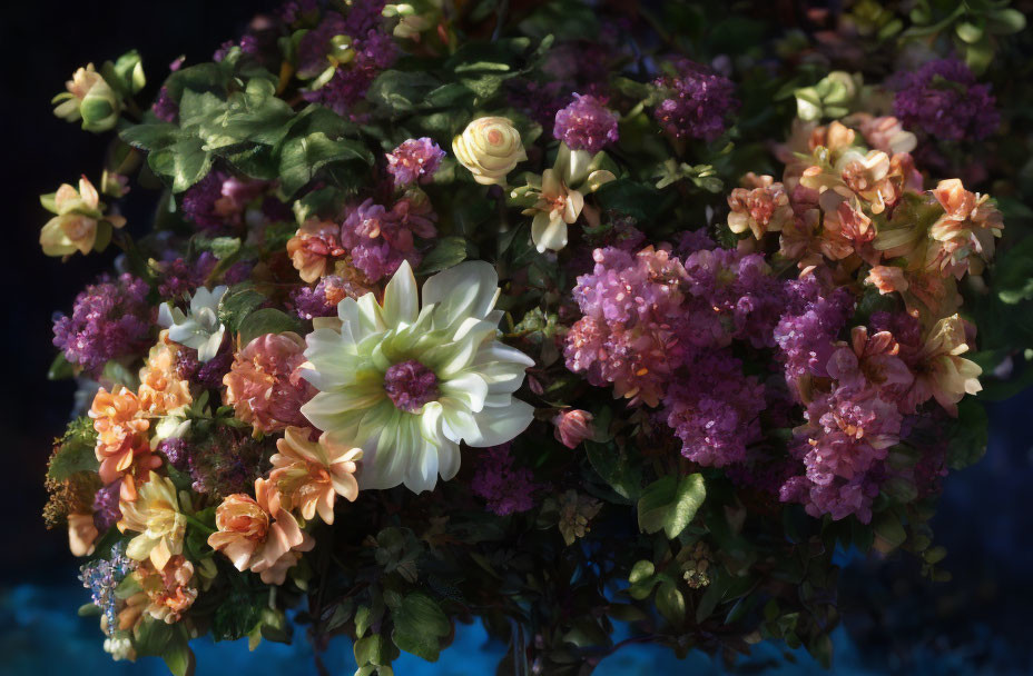 Colorful Bouquet of Cream, Orange, and Purple Flowers on Dark Background