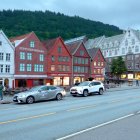 Colorful Victorian-style houses on whimsical dusk street