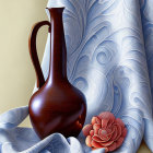 Wooden Jug on Patterned Fabric with Blue and Red Designs