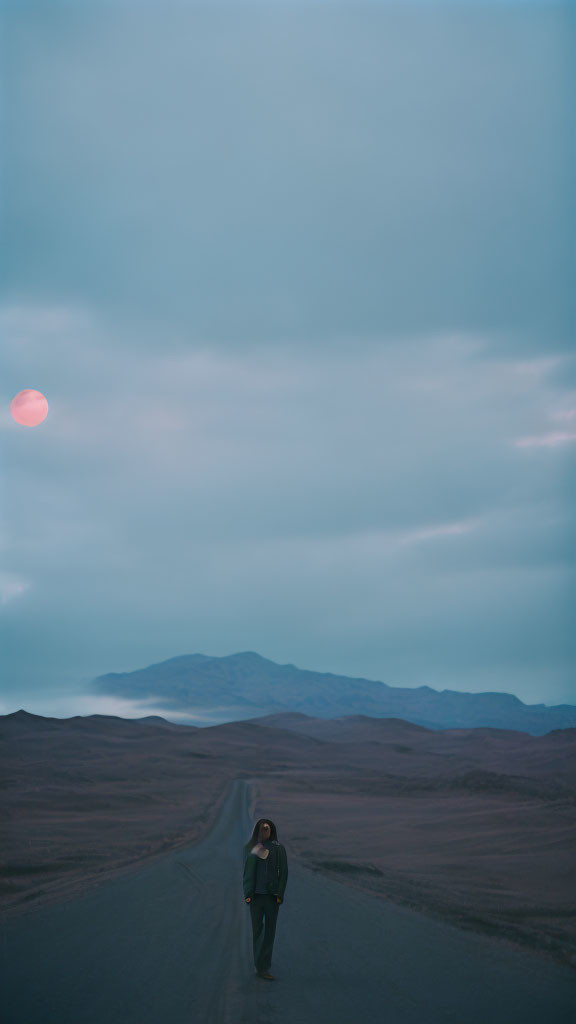 Person walking on remote road in vast barren terrain under reddish moon