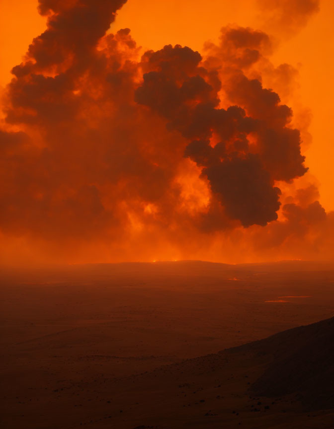 Fiery orange sky with billowing smoke clouds over vast landscape