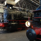 Detailed 3D Render: Vintage Steam Locomotives in Ornate Train Station