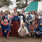 Colorful anthropomorphic animal performers at circus event