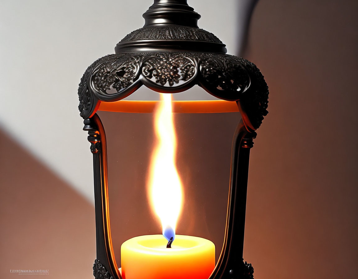 Ornate lantern with lit candle casting warm glow