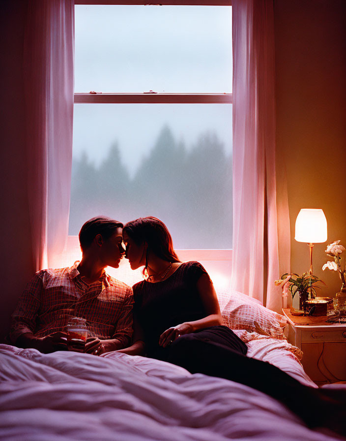 Intimate Couple Moment by Window at Dusk