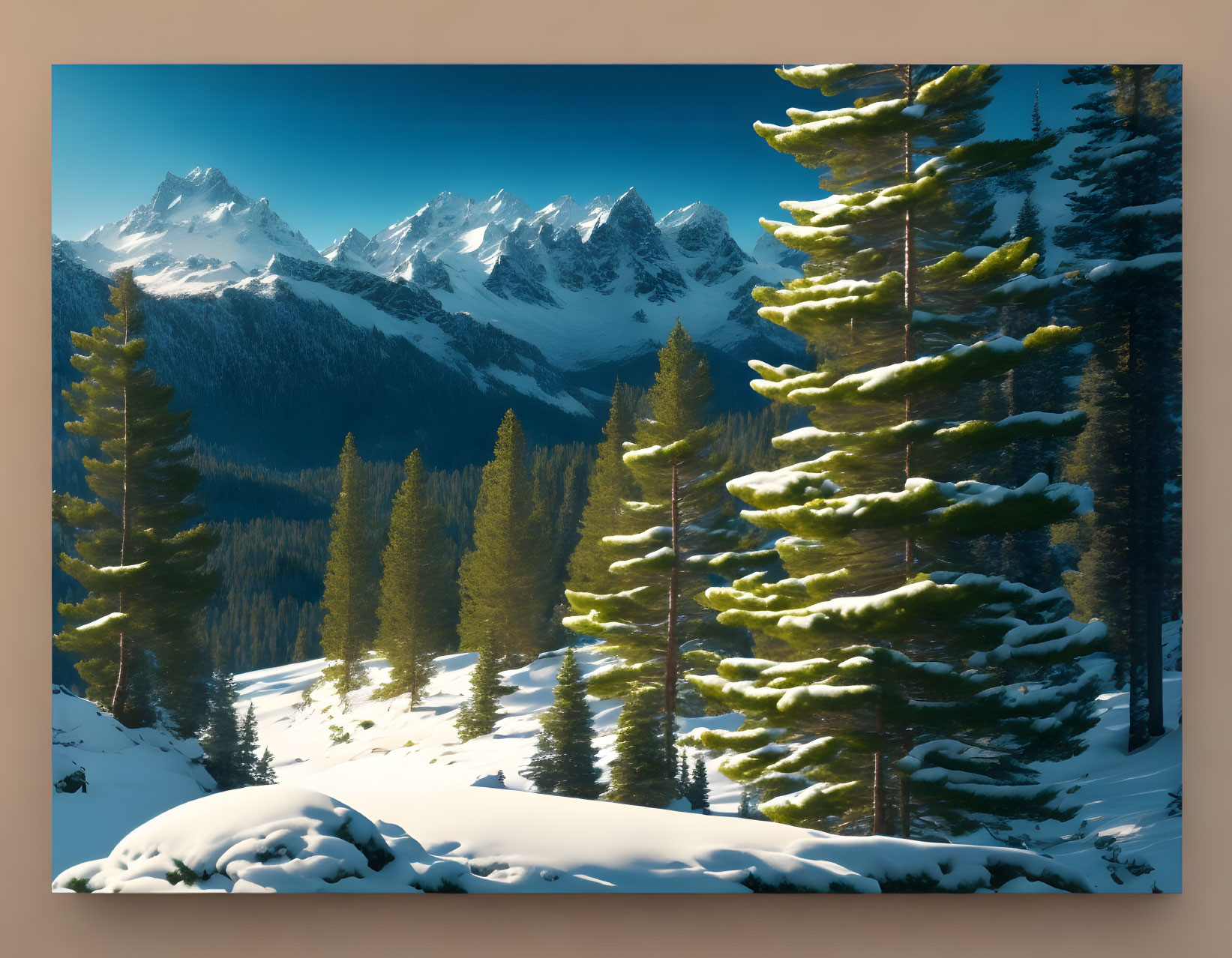 Snow-covered pine trees and mountain peaks under clear blue sky