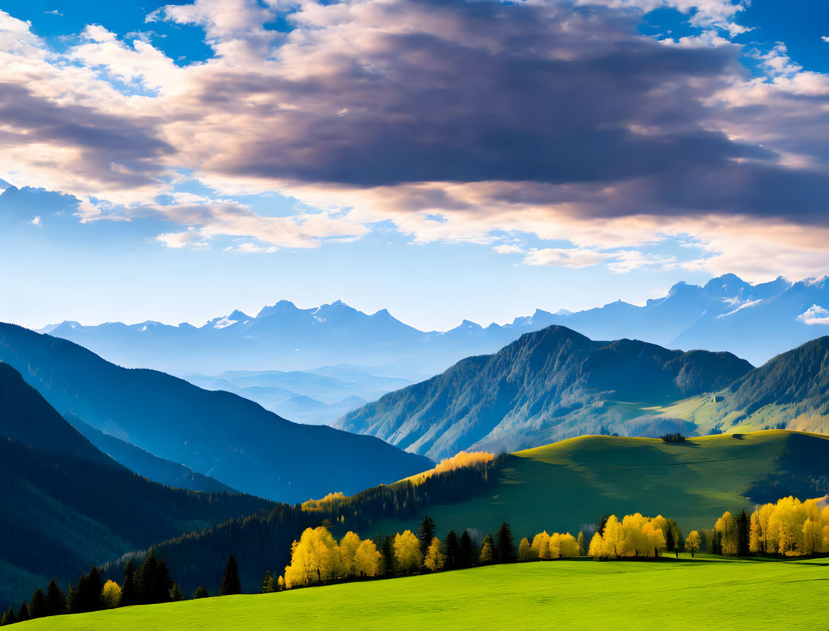 Scenic landscape: green hills, yellow trees, snow-capped mountains, dramatic sky