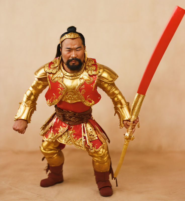 Ornate golden-red armored warrior with red sword on beige background