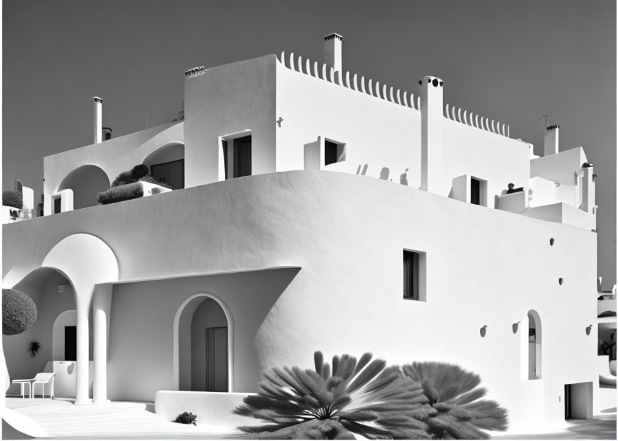 Mediterranean Style Whitewashed Building with Curved Lines