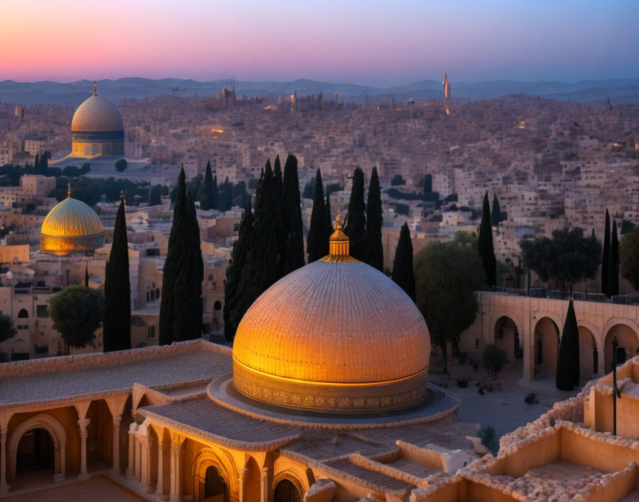 Aerial view of Jerusalem at dusk with Dome of the Rock and tree silhouettes