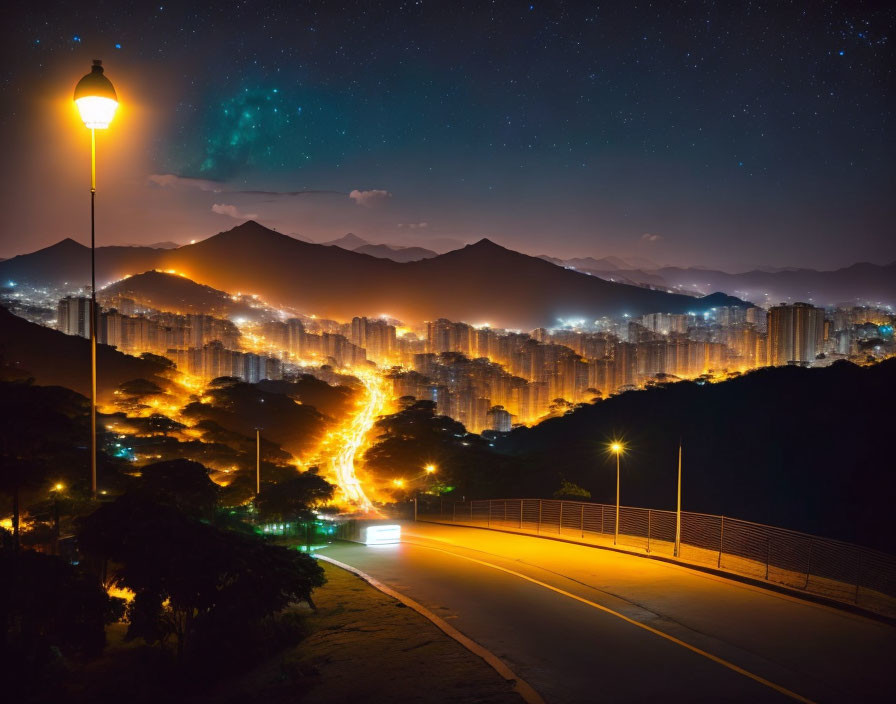 Winding Road Overlooking City at Night