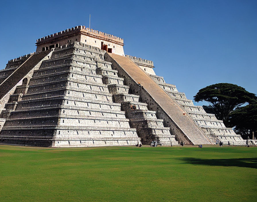 Ancient Mesoamerican Step Pyramid Under Clear Blue Sky