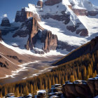 Snow-covered mountain landscape with evergreen forest and rustic buildings