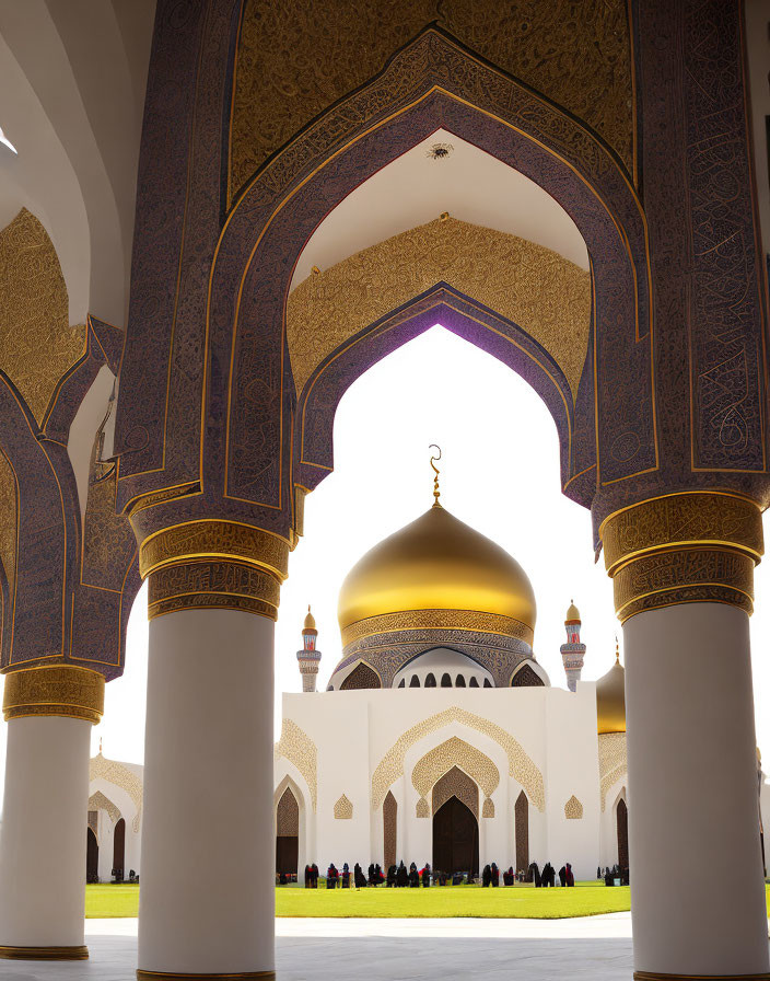 Mosque doorway with golden dome and intricate patterns