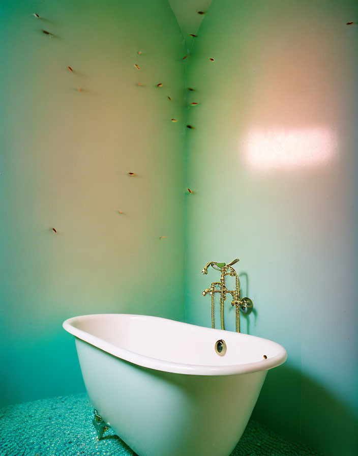 Vintage White Clawfoot Bathtub with Gold Fixtures in Teal Bathroom