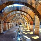 Grand Architectural Space with Ornate Arches and Motifs