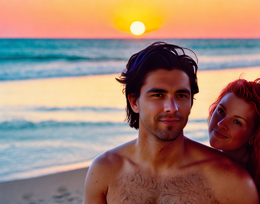 Couple embracing at beach during sunset