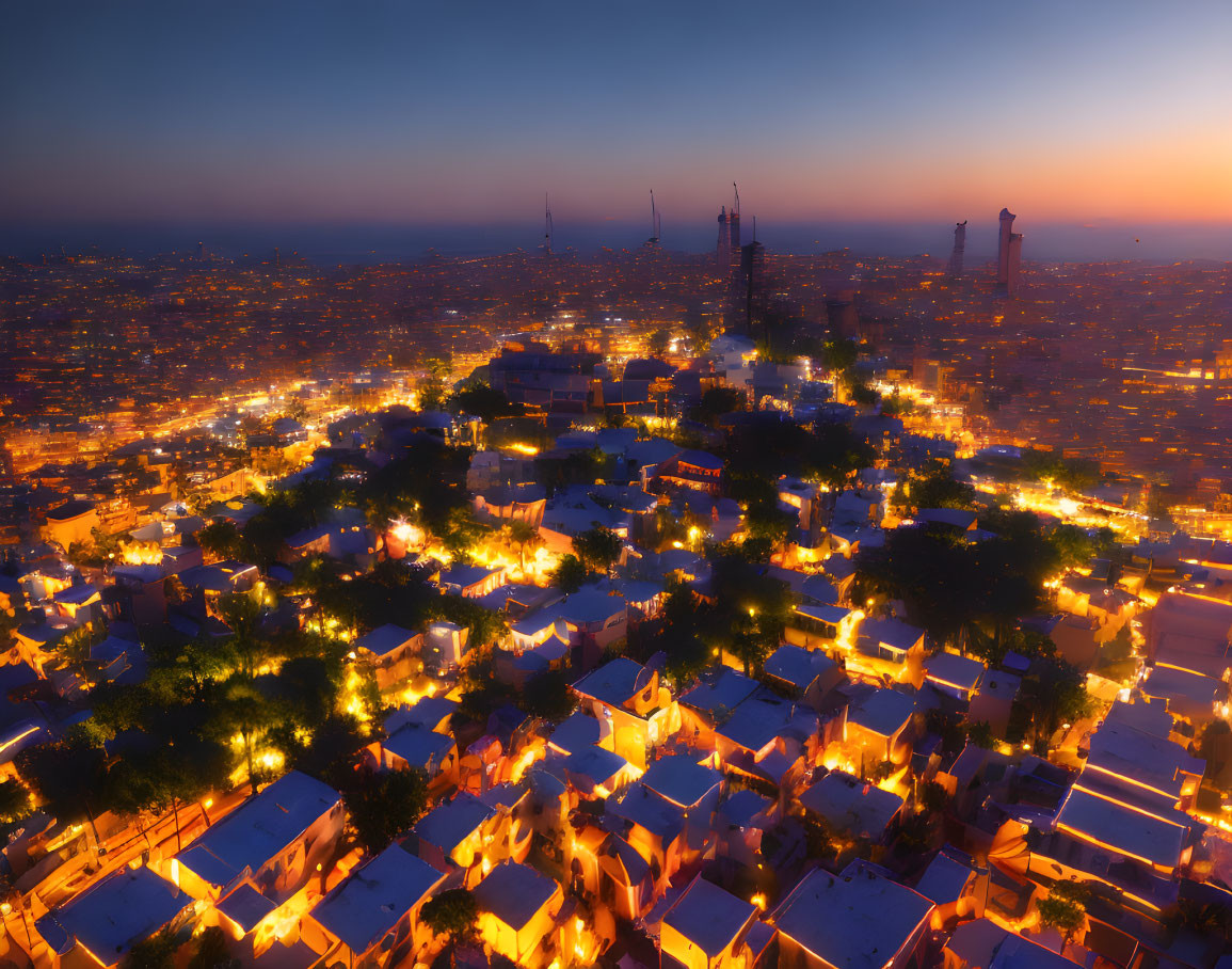 Cityscape at Twilight: Illuminated Streets and Buildings in Aerial View