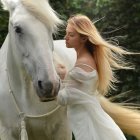 Woman in white dress standing with white horse in lush green foliage