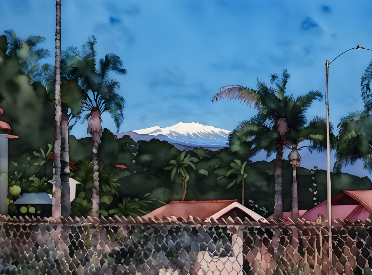 Snow-capped mountain view over chain-link fence with palm trees, rooftops, and dusky sky