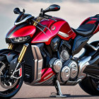 Red Sports Motorcycle with Futuristic Design and Black Wheels on Open Road