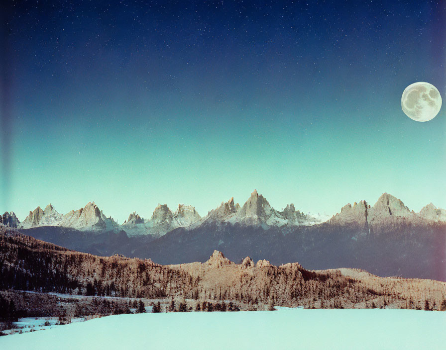 Snow-covered night landscape with mountain range, starry sky, and large moon.