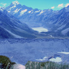 Stylized blue mountains with snow-capped peaks in watercolor