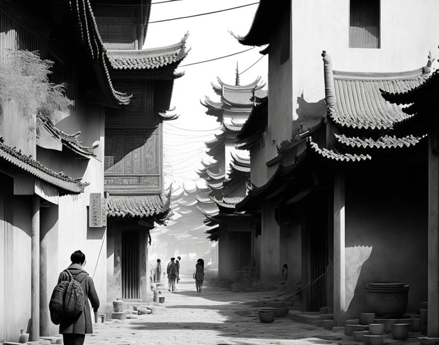 Backpacker walks through serene Asian street with traditional buildings and lanterns