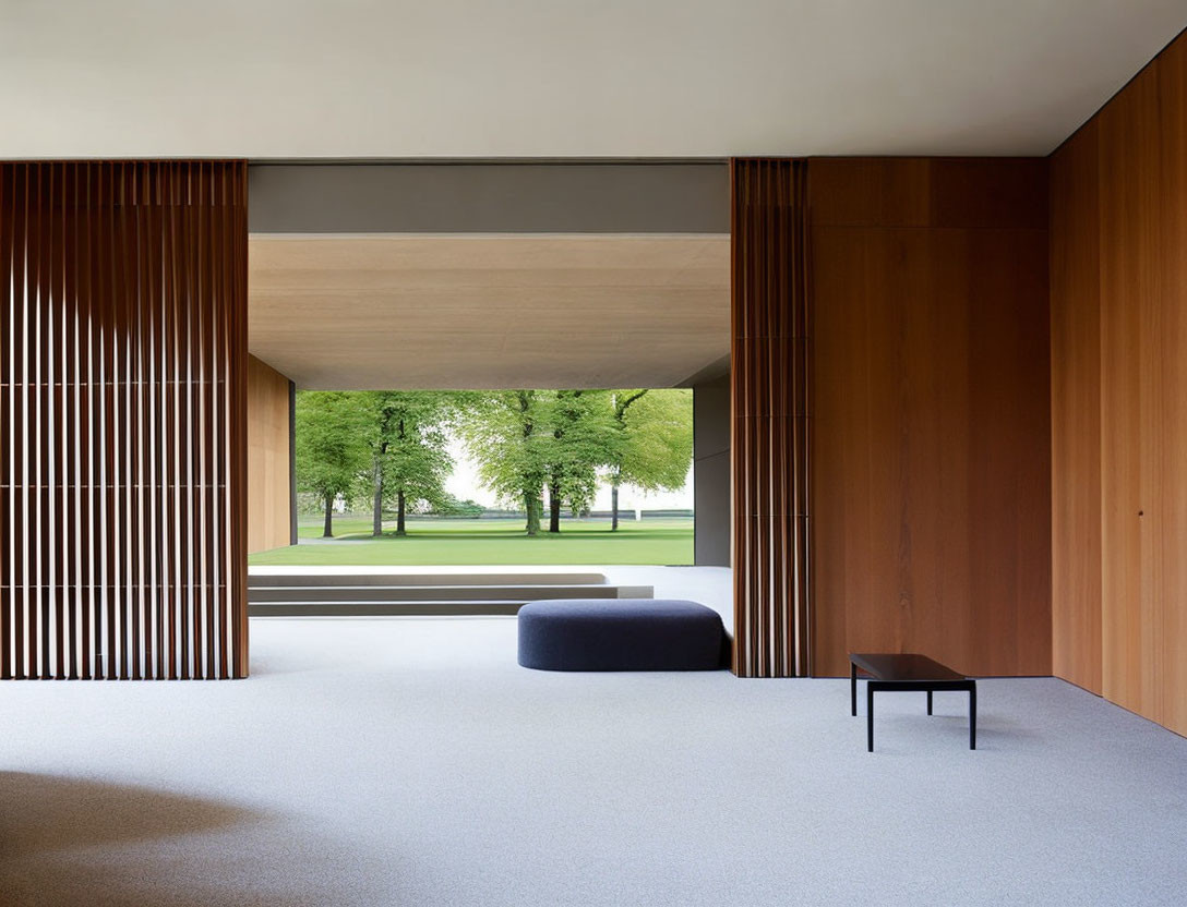 Minimalist Interior with Large Windows, Wooden Paneling, Grey Carpet, Blue Ottoman, and Black Table