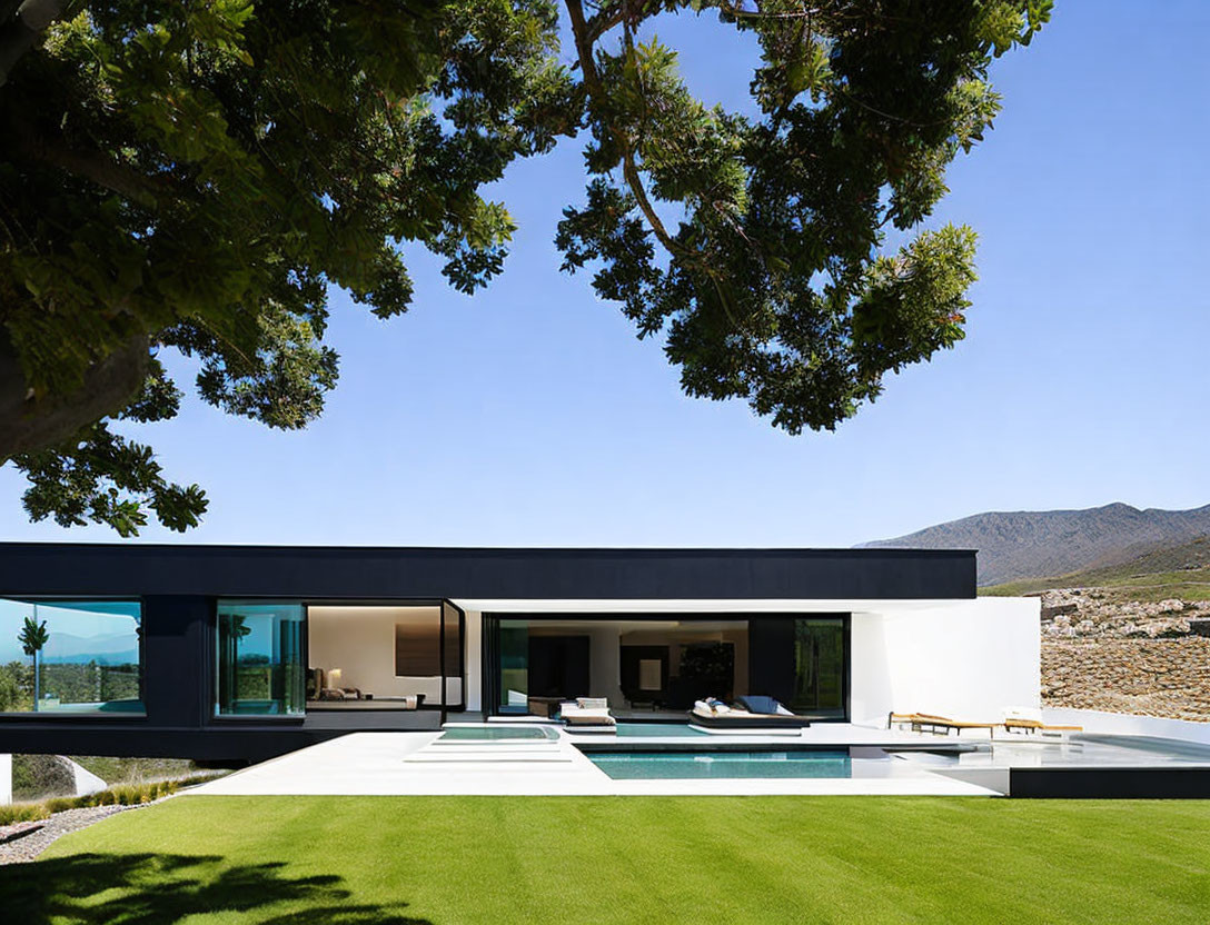 Contemporary House with Large Windows, Flat Roof, Pool, and Mountain View